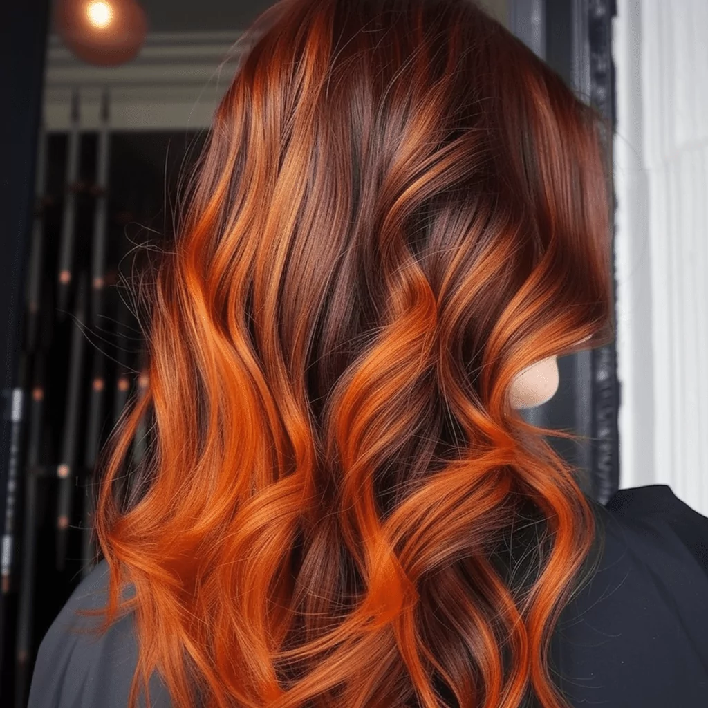 Orange Highlights in Dark Red Hair