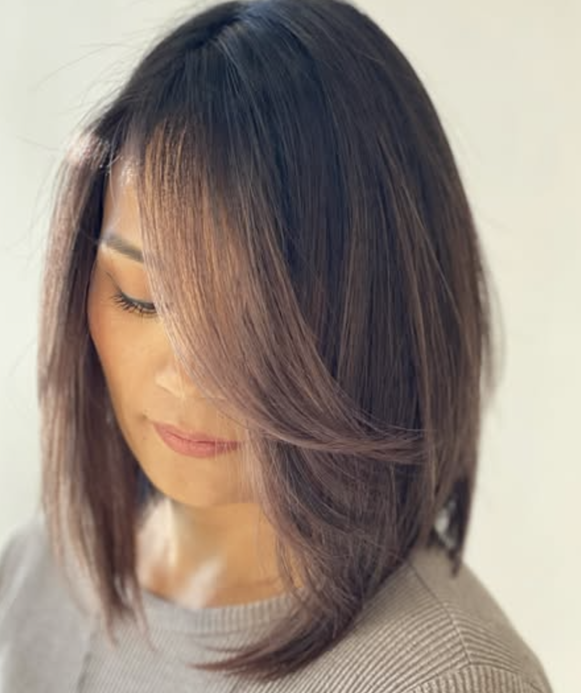 Angled Medium-Length Cut with Side Bangs