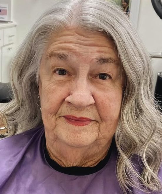 Beachy Waves with Long Layered Bangs