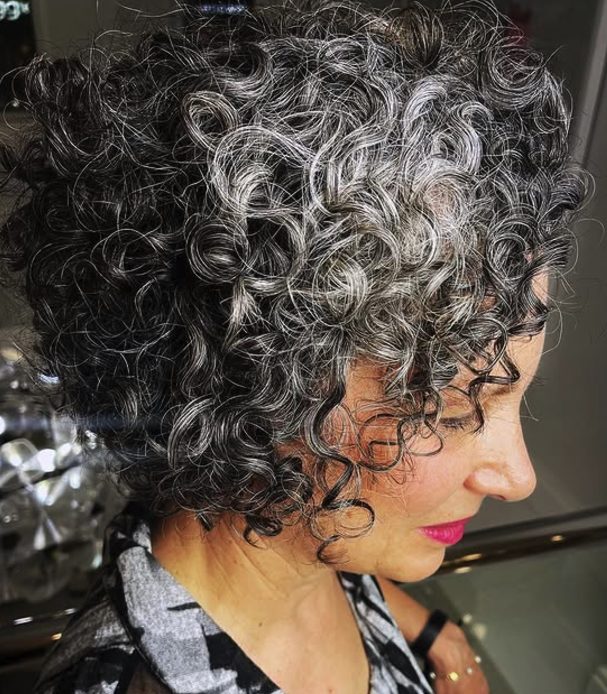 Bouncy Curly Bob with Layered Bangs