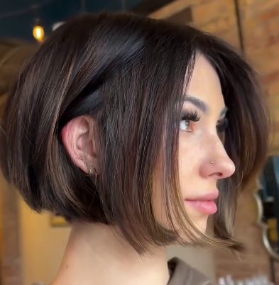 Chin-Length Layered Bob for Round Faces