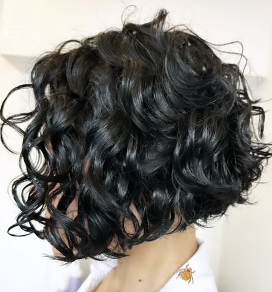 Curly Layered Bob with Side-Swept Bangs