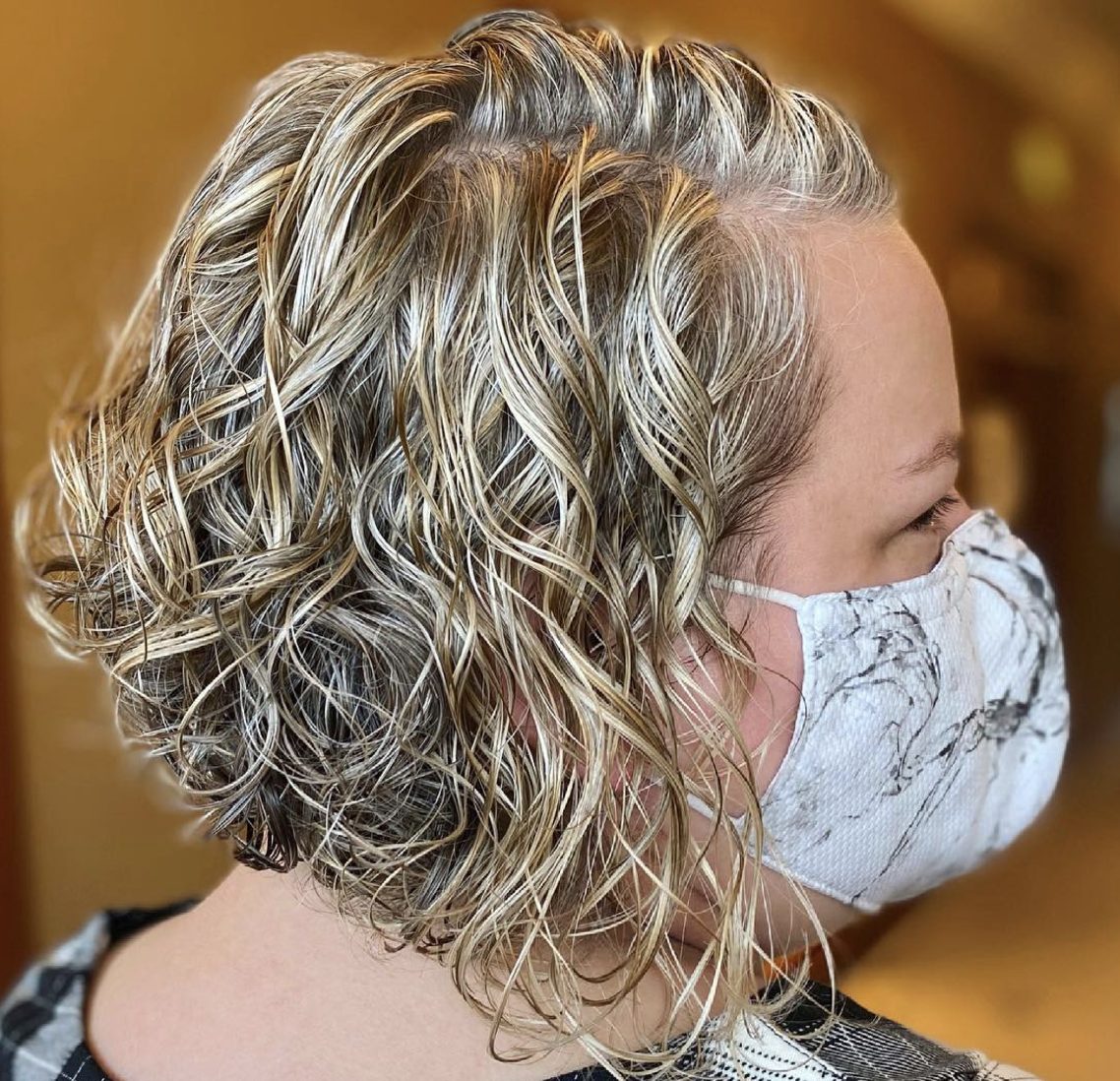 Edgy Curly Undercut Bob