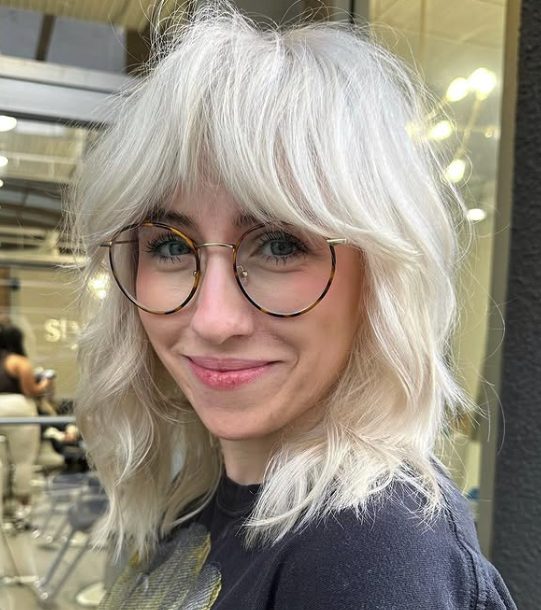 Icy Blonde Shag with Choppy Layers