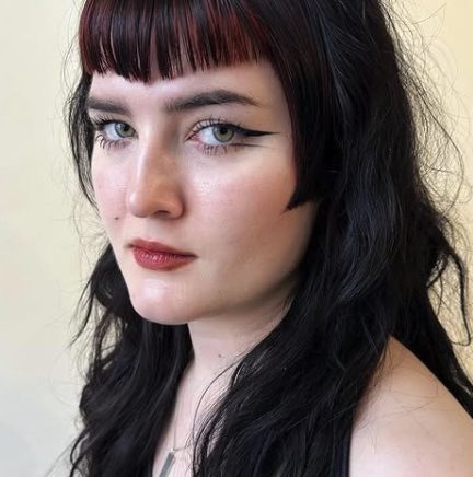 Jet-Black Shag with Sharp Bangs