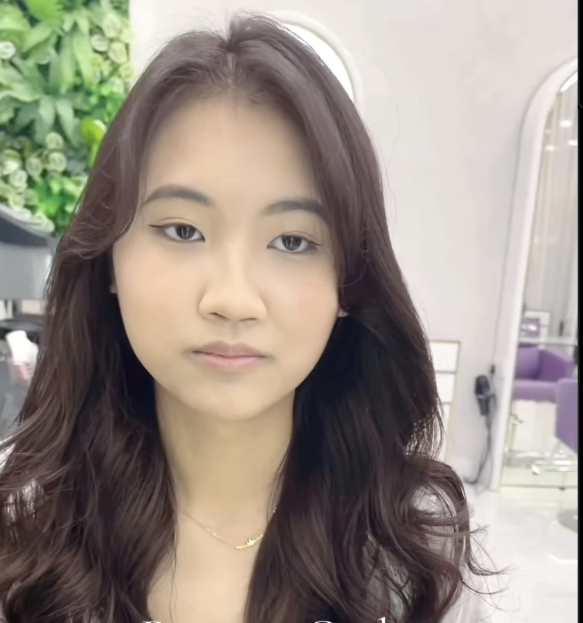 Layered Princess Curls with a Center Part