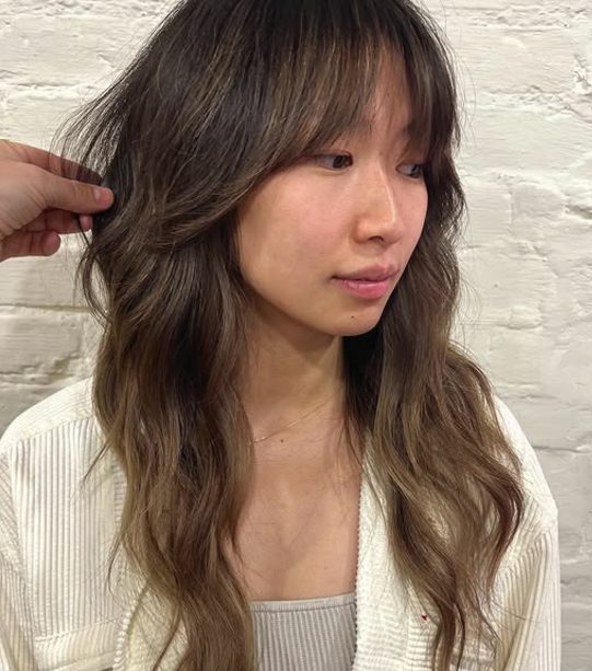 Medium-Length Shag with Airy Curls and a Light Fringe