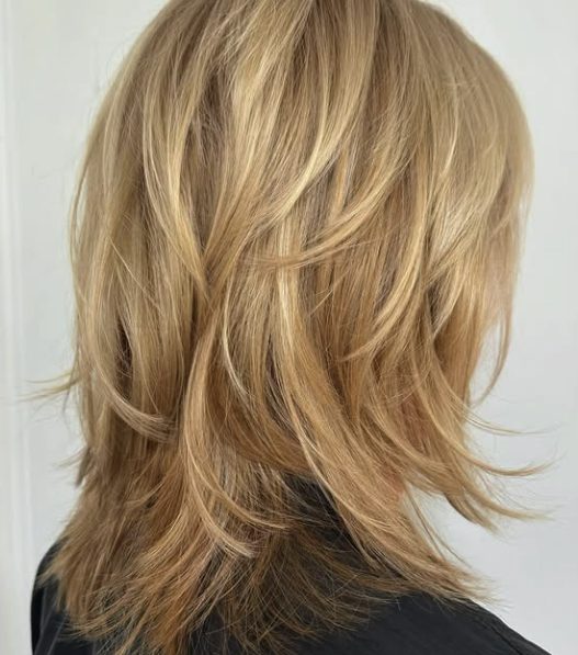 Medium-Length Shag with Bold Golden Highlights