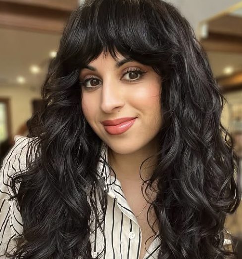 Medium-Length Shag with Glossy Black Curls