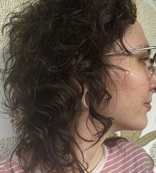 Natural Curls in a Layered Shag Style