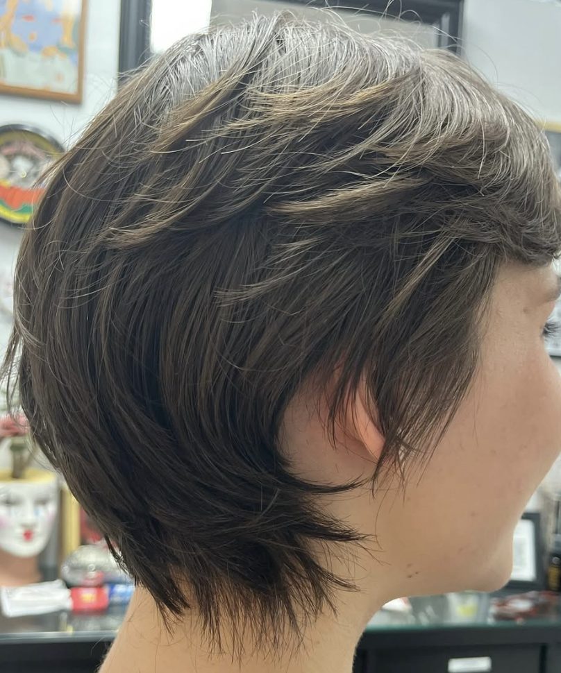 Pixie Cut with Long Feathered Bangs