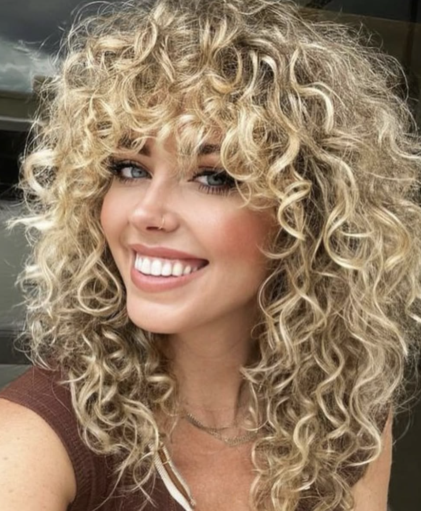 Shaggy Medium-Length Cut for Curly Hair