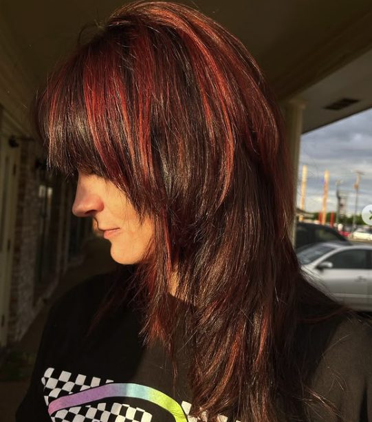 Sleek Shag with Subtle Red Accents