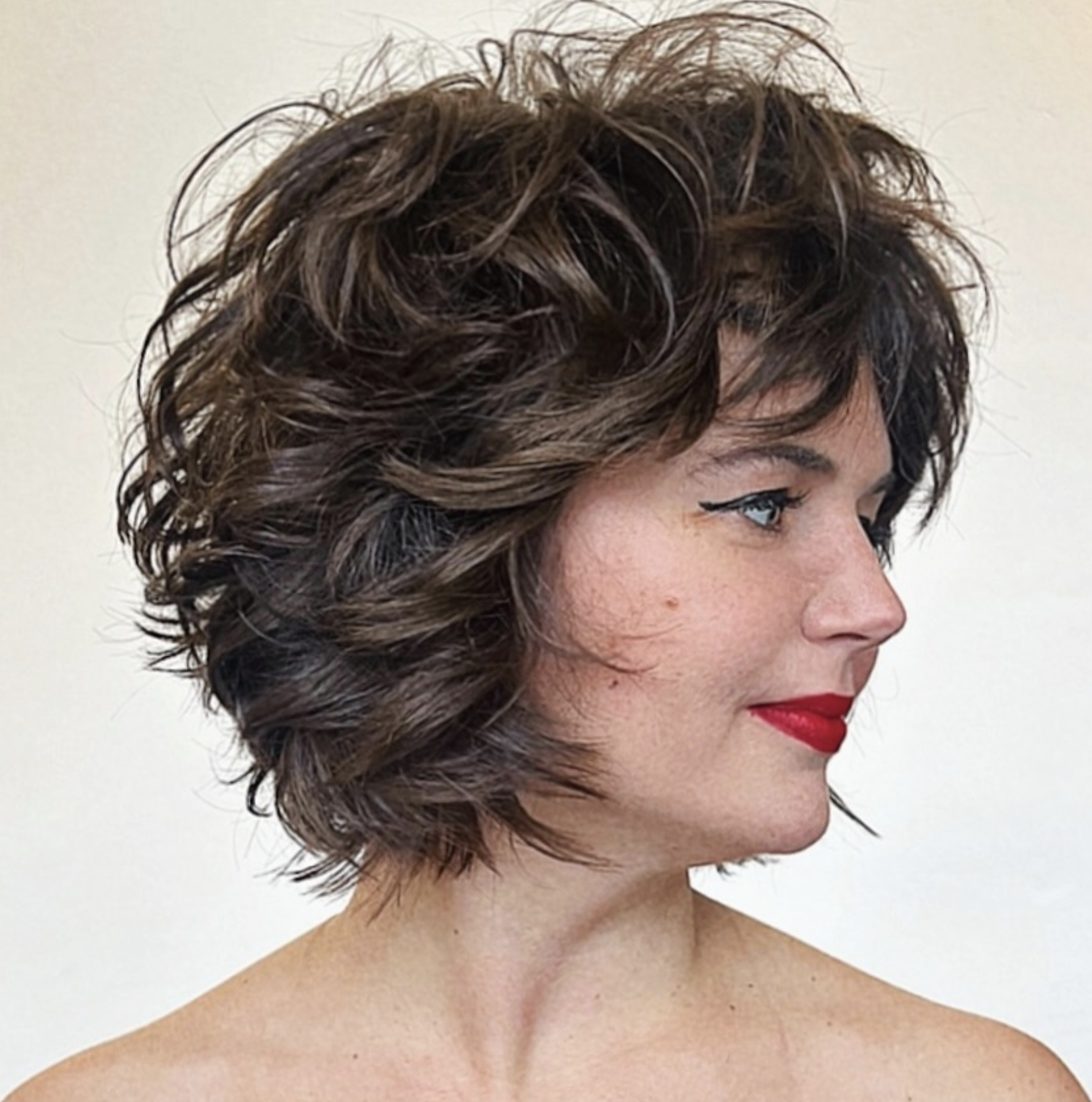 Sophisticated Curly Bob with Bangs
