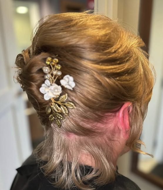 Sophisticated Updo with Side-Swept Fringe