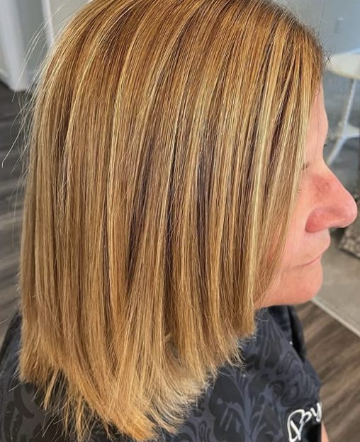 Straight Mid-Length Cut with Arched Bangs