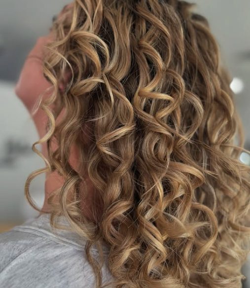 Sun-Kissed Blonde Shag with Loose Curls