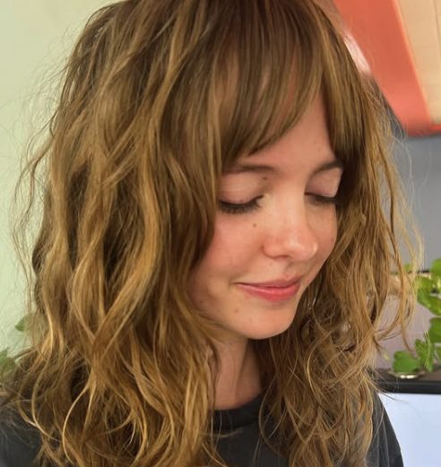Wavy Layered Shag with Side-Swept Bangs